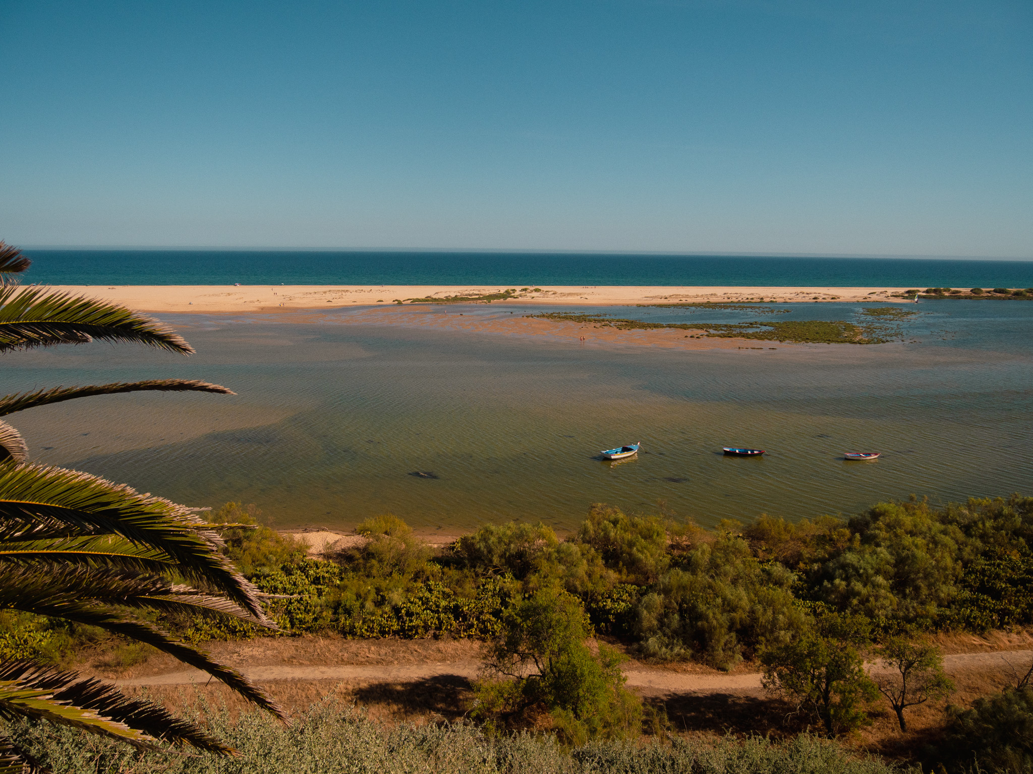 The shifting sandbanks and water of the bay
