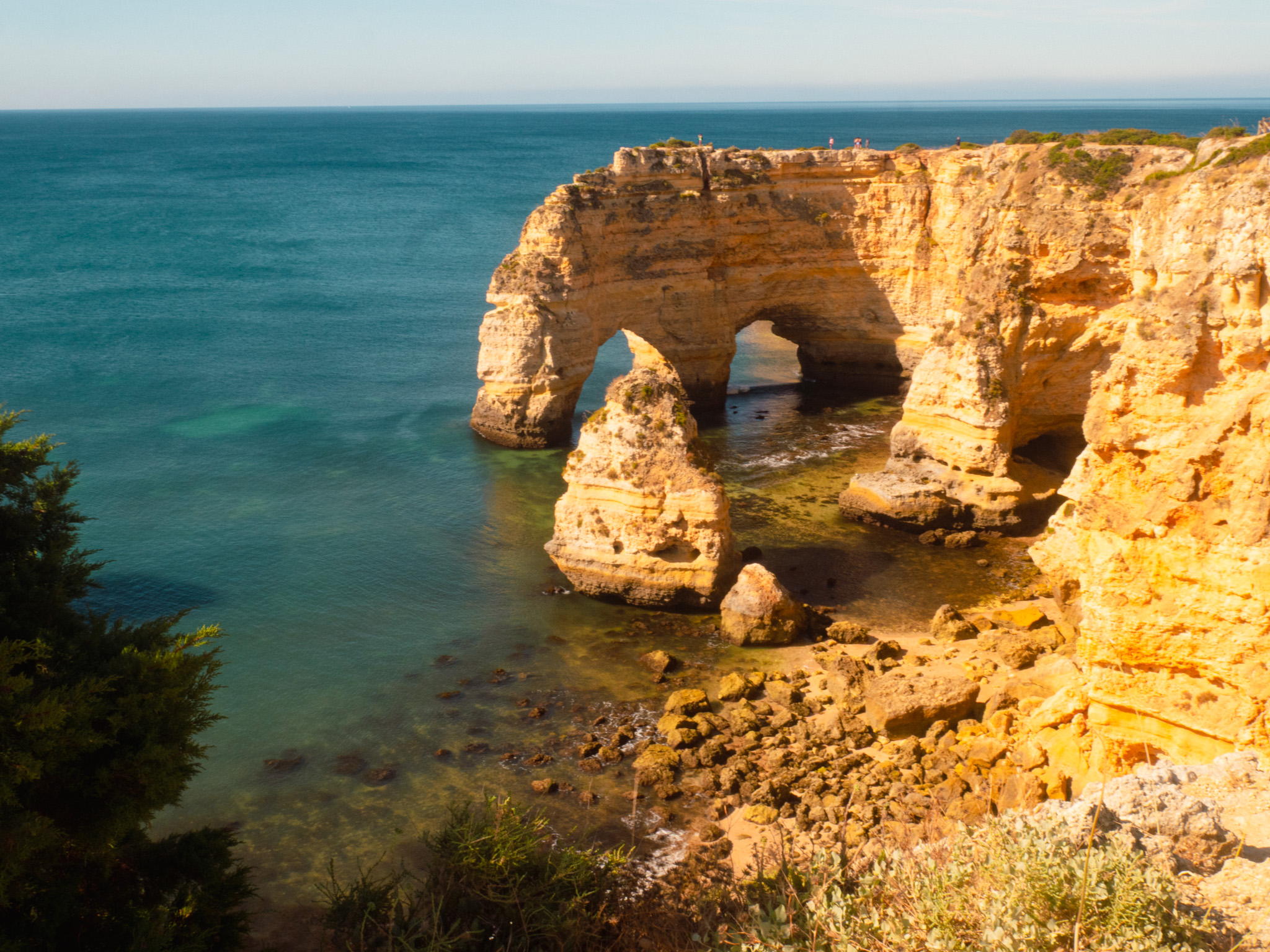 Ochre cliffs and clear blue coves along the Seven Hanging Valleys trail