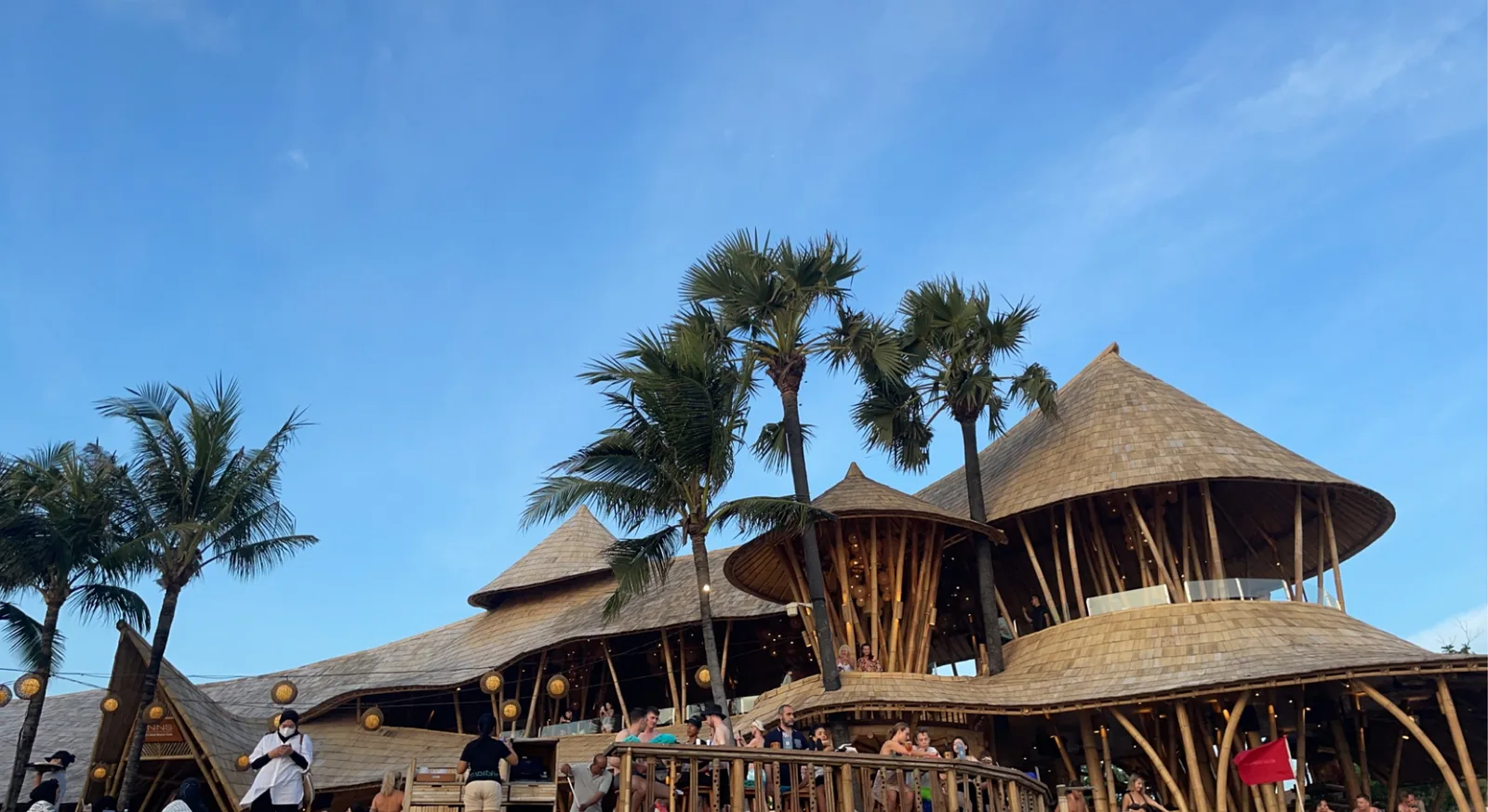 Bamboo beach club with thatched domes