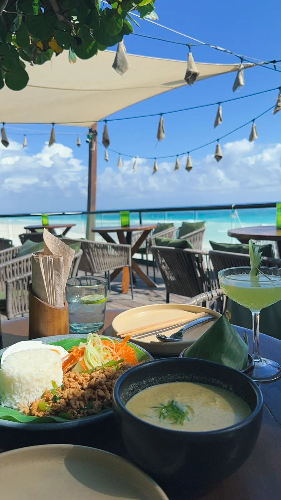 Thai curry, larb and a green cocktail on the sea-view terrace at Mezzanine